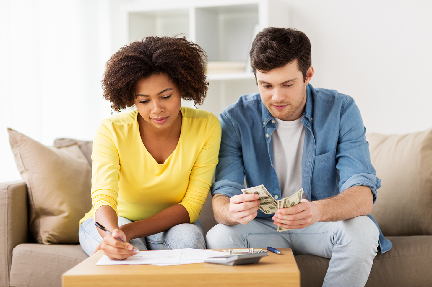 Couple discussing household budget and savings